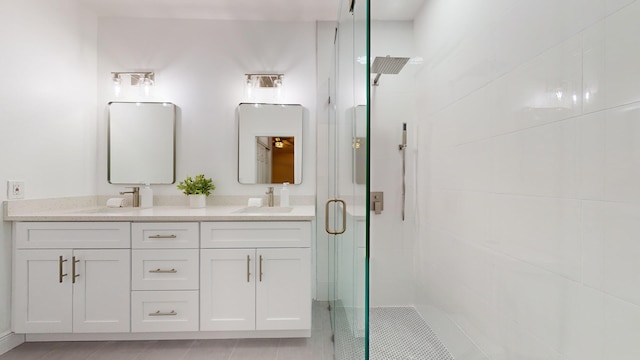 bathroom with vanity and walk in shower