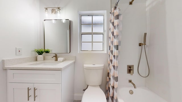 full bathroom featuring vanity, toilet, and shower / bath combo