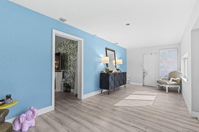 living area featuring light hardwood / wood-style flooring