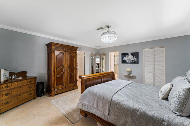 bedroom with a closet, a chandelier, crown molding, and light tile patterned floors