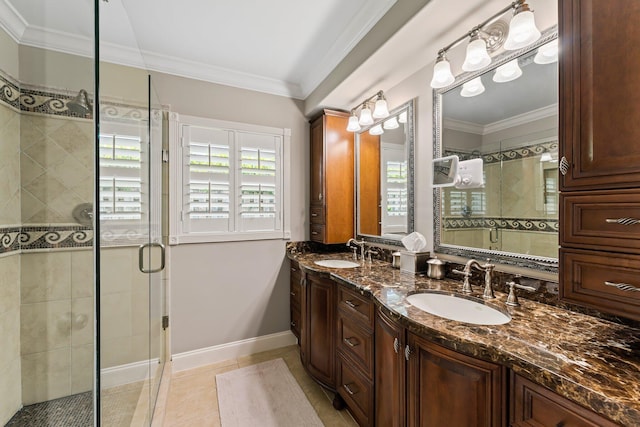 bathroom with crown molding, walk in shower, tile patterned floors, and vanity