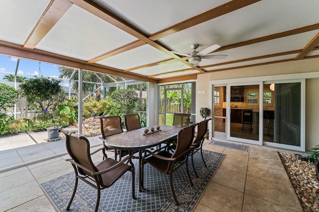 sunroom featuring coffered ceiling and ceiling fan