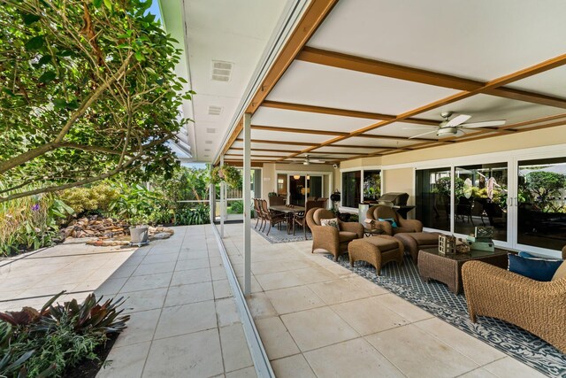 sunroom / solarium with ceiling fan