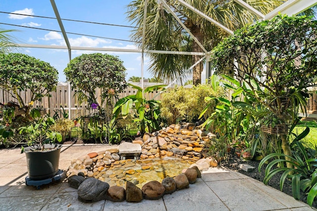 view of yard featuring a lanai