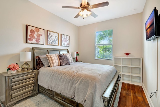 bedroom featuring dark wood-type flooring and ceiling fan