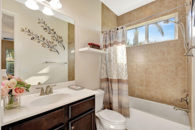 full bathroom with vanity, toilet, and shower / bath combo with shower curtain