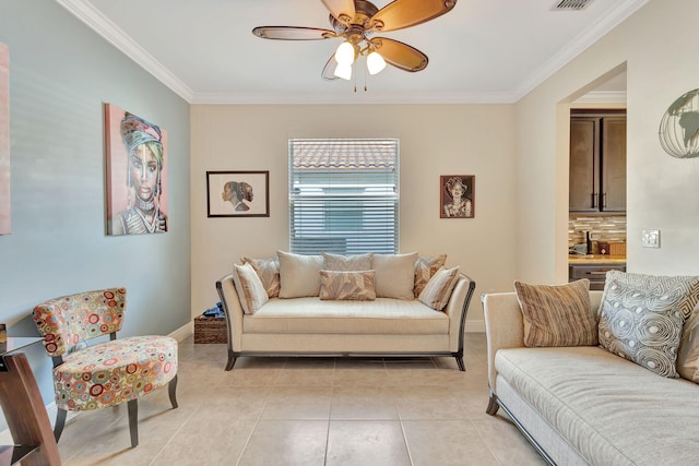 tiled living room featuring ornamental molding and ceiling fan