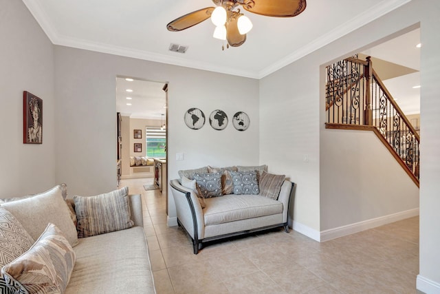 tiled living room featuring ornamental molding and ceiling fan