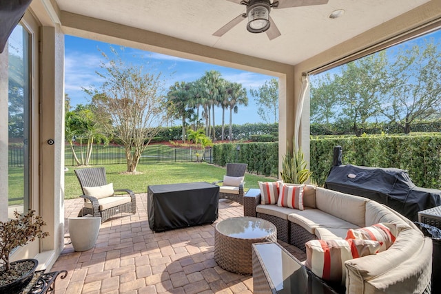 view of patio with an outdoor hangout area and ceiling fan