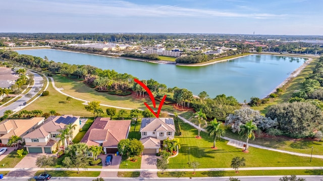 birds eye view of property featuring a water view