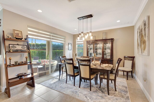 tiled dining area with crown molding