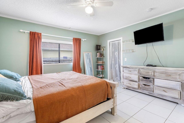 tiled bedroom with ceiling fan, crown molding, and a textured ceiling