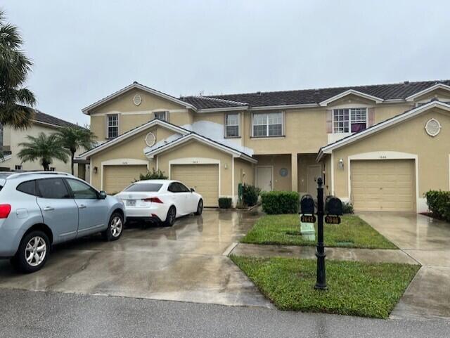 view of property featuring a garage