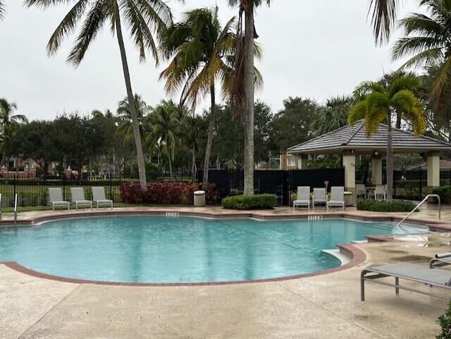 view of swimming pool with a patio area and a gazebo