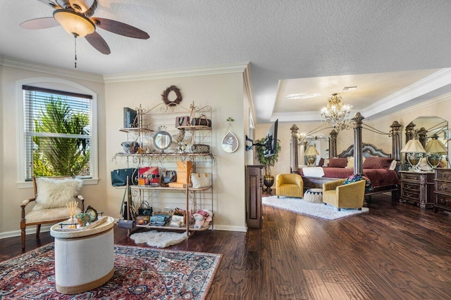 sitting room featuring crown molding, dark wood-type flooring, and a textured ceiling