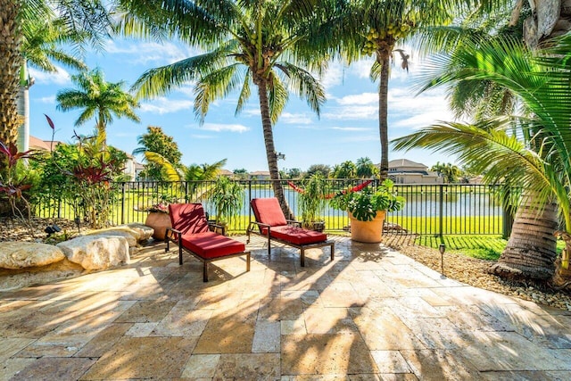 view of patio / terrace with a water view