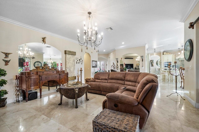 living room featuring crown molding, a textured ceiling, and an inviting chandelier