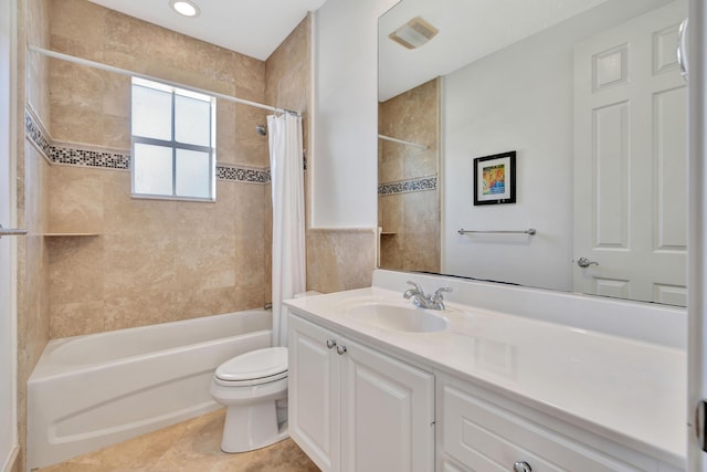 full bathroom featuring tile patterned flooring, vanity, toilet, and shower / bathtub combination with curtain