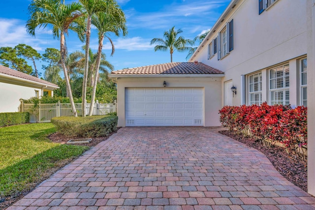 garage with a yard