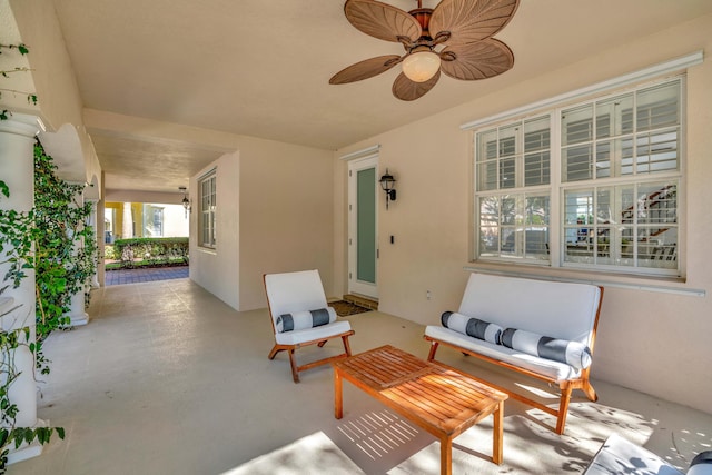 view of patio featuring ceiling fan