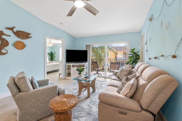 living room with light wood-type flooring, vaulted ceiling, and ceiling fan