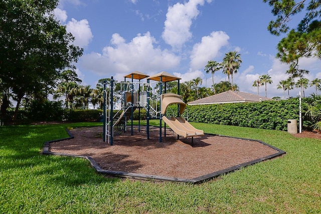 view of play area featuring a lawn