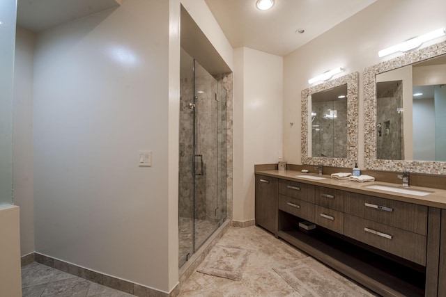 bathroom featuring vanity and a shower with shower door