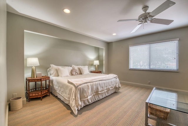 carpeted bedroom with ceiling fan