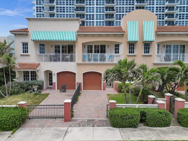 view of front of property with a garage