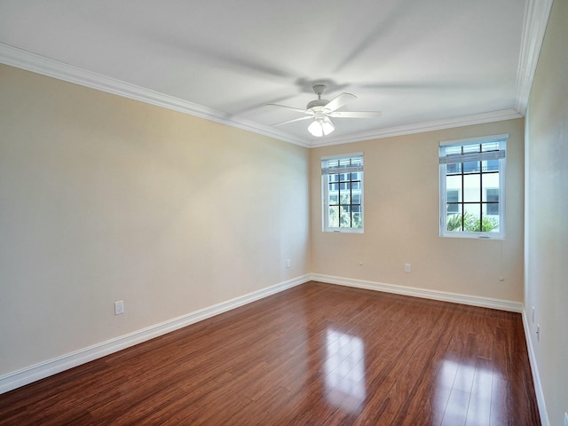 unfurnished room with crown molding, ceiling fan, and dark hardwood / wood-style flooring