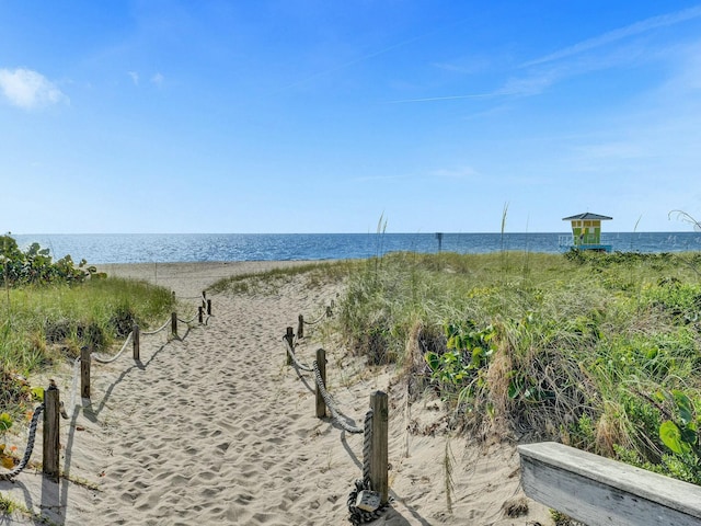 view of water feature featuring a beach view