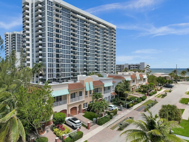 view of building exterior featuring a water view