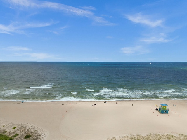 property view of water featuring a beach view