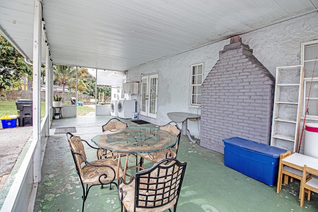 view of patio / terrace featuring independent washer and dryer