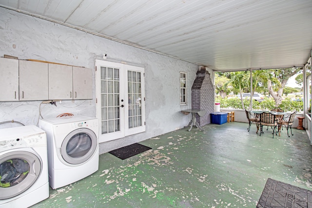 clothes washing area featuring independent washer and dryer and french doors