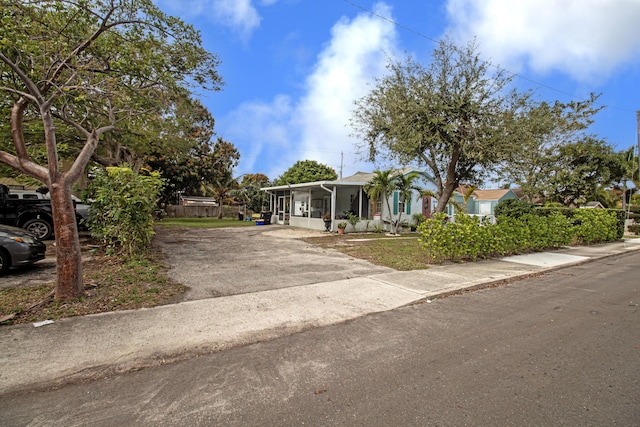 view of front of property with a carport