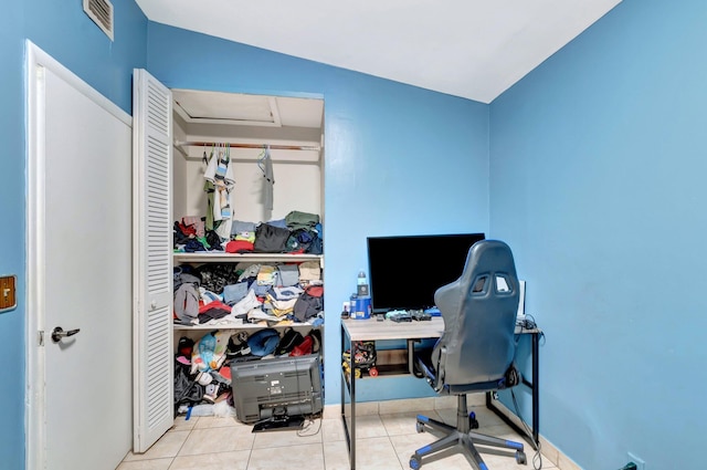 tiled home office featuring visible vents