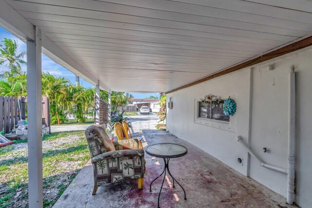 view of patio featuring fence