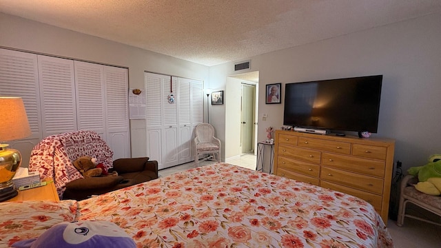 bedroom featuring a textured ceiling