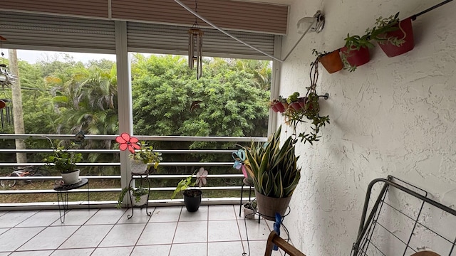 unfurnished sunroom with a healthy amount of sunlight