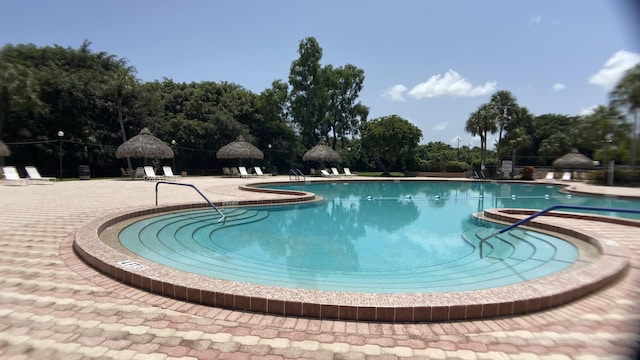 view of pool with a gazebo and a patio