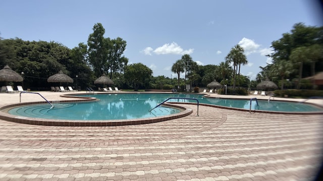 view of pool featuring a patio area and a gazebo