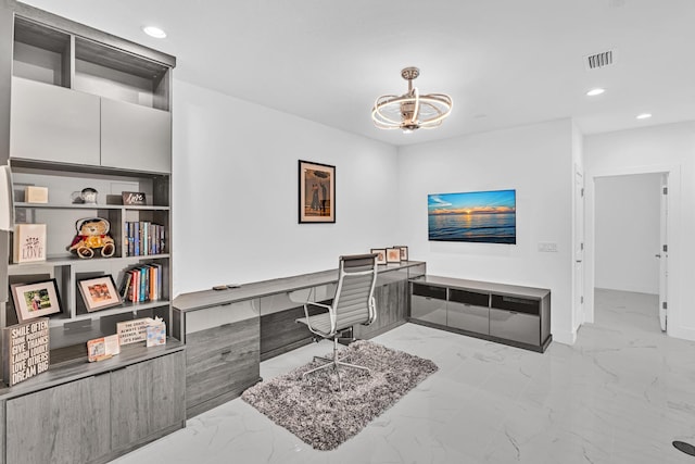 office area featuring a notable chandelier and built in desk