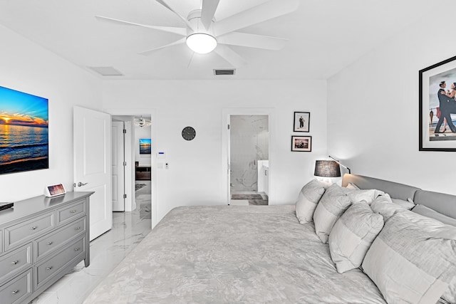 bedroom with ceiling fan and connected bathroom