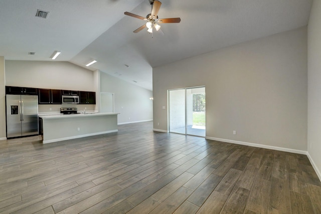 unfurnished living room with ceiling fan, high vaulted ceiling, and light hardwood / wood-style floors