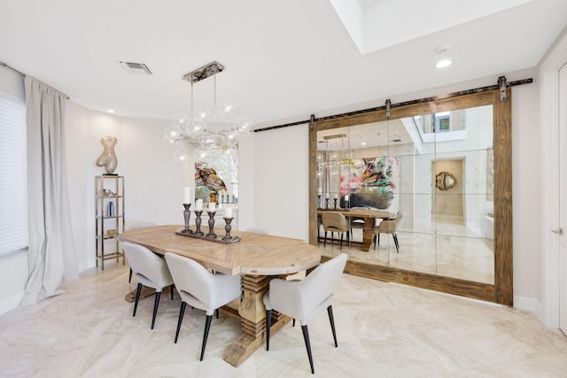 dining area with a barn door