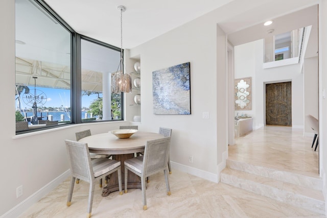 dining area with a chandelier