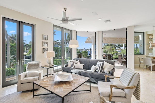 interior space with french doors and ceiling fan