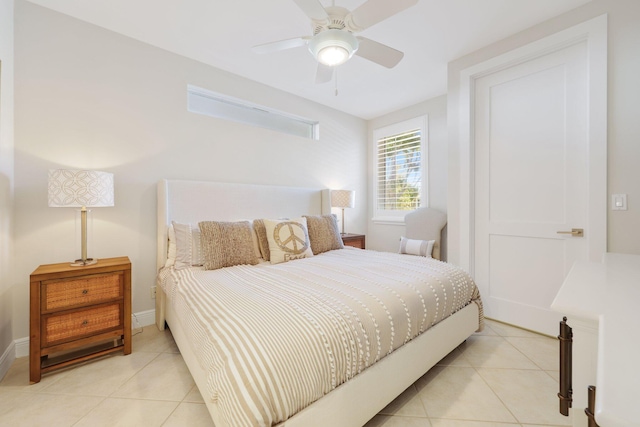 tiled bedroom with ceiling fan