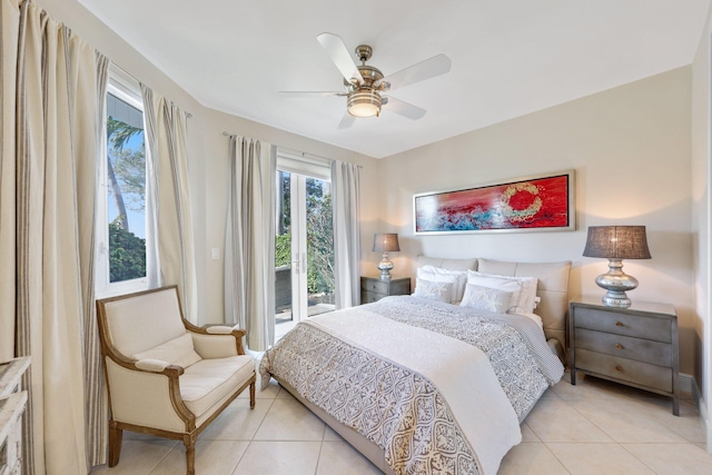 tiled bedroom with access to exterior and ceiling fan